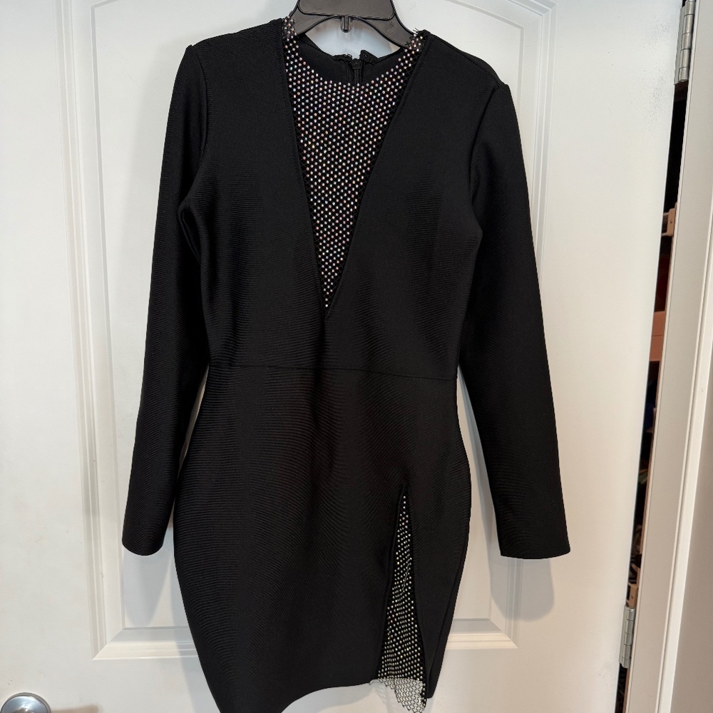 Body con black mini dress with rhinestone mesh inserts